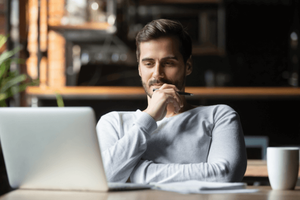 Energy worker working on laptop at home